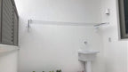 Varal Artesanal de Muro Fixo